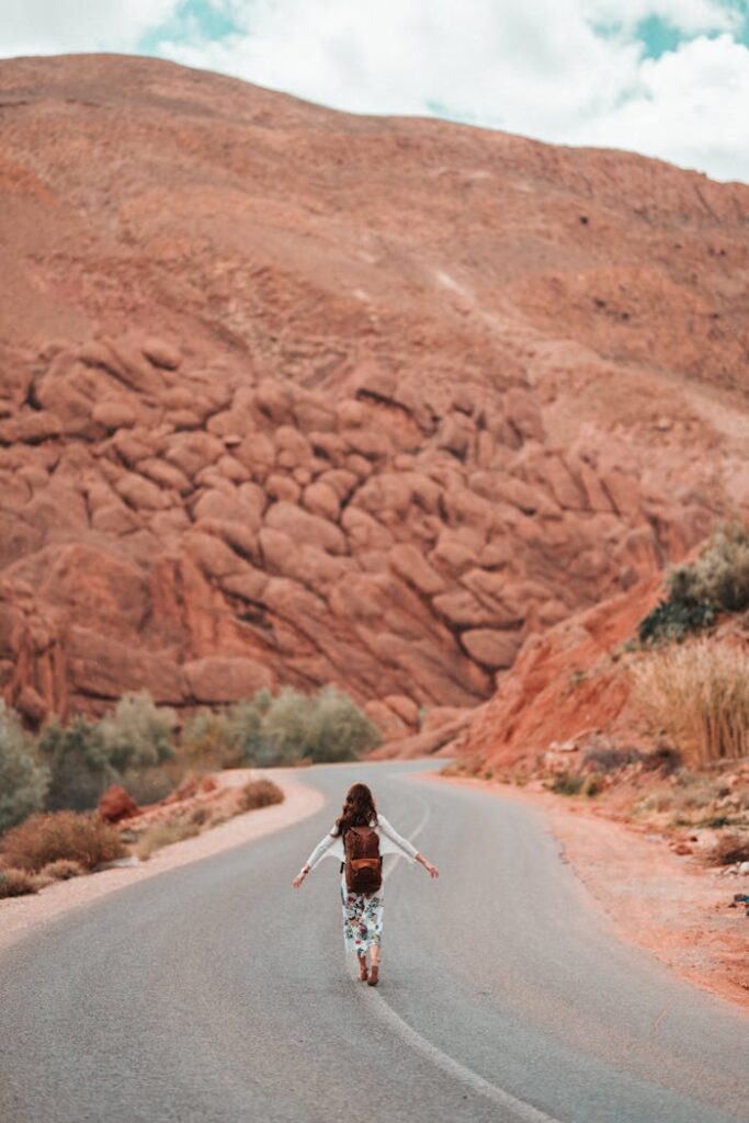 Photo Of Person In The Middle On The Road